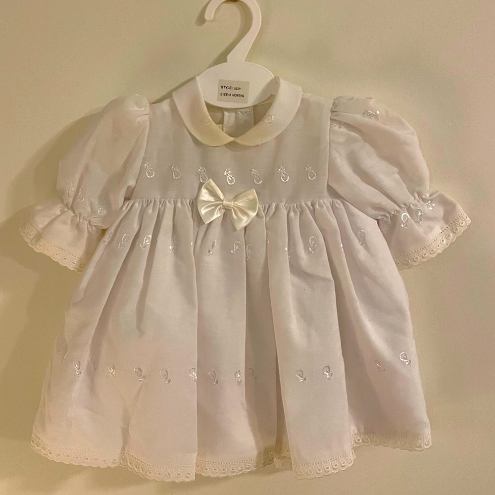 Vintage white dress with white pantaloons and white beret. 🤍